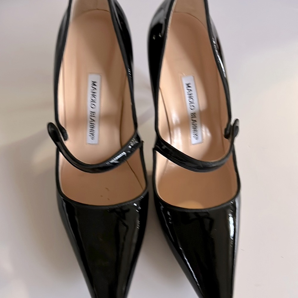 Those are one of a kind black patent leather pumps. They are super comfortable.